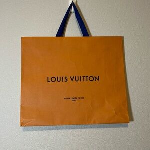 Louis Vuitton large shopping bag. Has some wrinkles